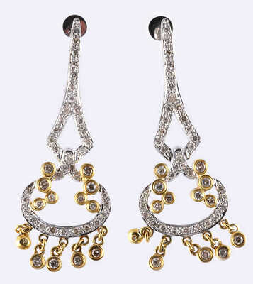 Серьги с бриллиантами из золота 750 пробы общим весом 10,3 грамма